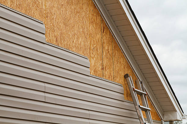 Professional Siding Installation technician working in Vintondale, PA